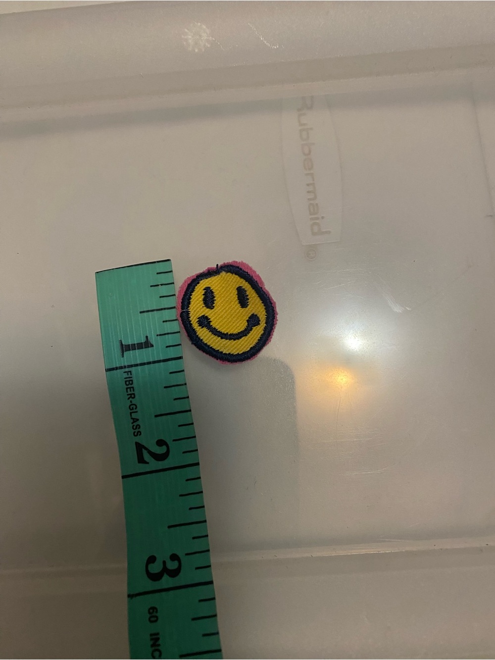 Embroidered happy face patch